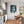 Poster Wandbild Verspielte Freude im Glas fuer Kueche und Esszimmer grauoderbeige Hochformat