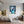 Poster Wandbild Verspielter Elefant im Glas fuer Jugendzimmer grauoderbeige Hochformat