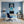 Poster Wandbild Verspielter Elefant im Wasser fuer Buero und Arbeitszimmer blau Hochformat