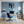 Poster Wandbild Verspielter Panther im Wasser fuer Buero und Arbeitszimmer blau Hochformat