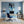 Poster Wandbild Verspielter Panther im Wasser fuer Buero und Arbeitszimmer blau Hochformat