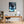 Poster Wandbild Verspielter Panther im Wasser fuer Buero und Arbeitszimmer warmeFarben Hochformat