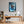 Poster Wandbild Verspielter Schimpanse im Wasser fuer Buero und Arbeitszimmer warmeFarben Hochformat