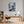 Poster Wandbild Verspieltes Eichhörnchen im Winterwald fuer Buero und Arbeitszimmer dunkelanthrazit Hochformat