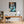 Poster Wandbild Verspieltes Zebra im Wasser fuer Buero und Arbeitszimmer warmeFarben Hochformat